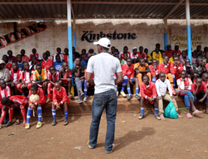 coaching youg football player in kenya